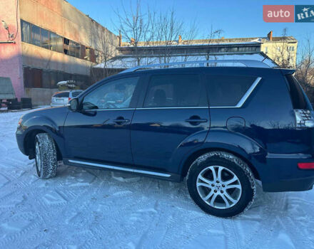 Синий Мицубиси Аутлендер, объемом двигателя 2 л и пробегом 257 тыс. км за 10500 $, фото 2 на Automoto.ua