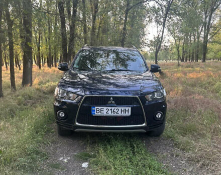 Синий Мицубиси Аутлендер, объемом двигателя 2.2 л и пробегом 250 тыс. км за 11500 $, фото 6 на Automoto.ua