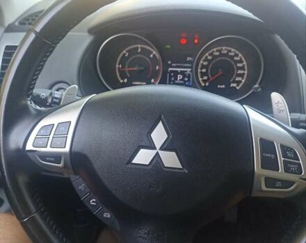 Синий Мицубиси Аутлендер, объемом двигателя 2.18 л и пробегом 223 тыс. км за 11200 $, фото 19 на Automoto.ua