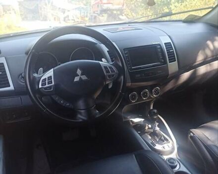 Синий Мицубиси Аутлендер, объемом двигателя 2.18 л и пробегом 223 тыс. км за 11200 $, фото 10 на Automoto.ua