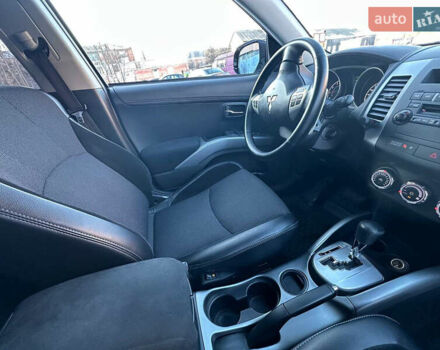 Синий Мицубиси Аутлендер, объемом двигателя 2 л и пробегом 257 тыс. км за 10500 $, фото 13 на Automoto.ua