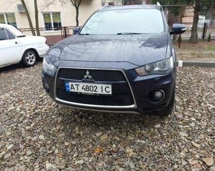 Синий Мицубиси Аутлендер, объемом двигателя 2.2 л и пробегом 220 тыс. км за 11450 $, фото 1 на Automoto.ua