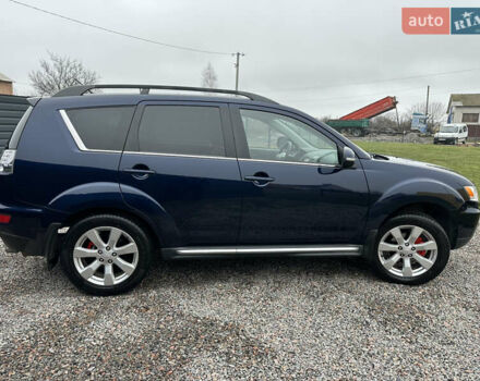 Синий Мицубиси Аутлендер, объемом двигателя 2.3 л и пробегом 202 тыс. км за 11650 $, фото 6 на Automoto.ua