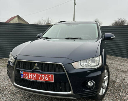 Синий Мицубиси Аутлендер, объемом двигателя 2.3 л и пробегом 202 тыс. км за 11650 $, фото 2 на Automoto.ua