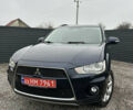 Синий Мицубиси Аутлендер, объемом двигателя 2.3 л и пробегом 202 тыс. км за 11650 $, фото 2 на Automoto.ua