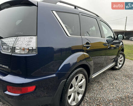 Синий Мицубиси Аутлендер, объемом двигателя 2.3 л и пробегом 202 тыс. км за 11650 $, фото 11 на Automoto.ua