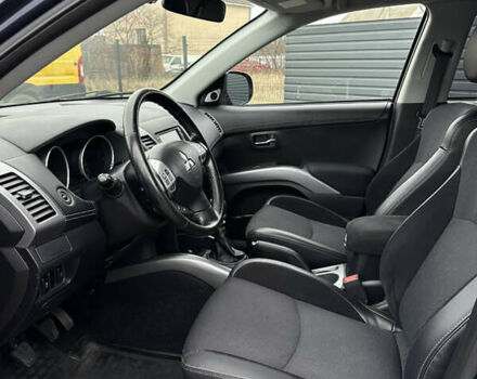 Синий Мицубиси Аутлендер, объемом двигателя 2.3 л и пробегом 202 тыс. км за 11650 $, фото 14 на Automoto.ua