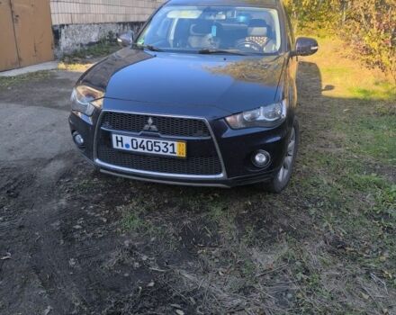 Синий Мицубиси Аутлендер, объемом двигателя 2.2 л и пробегом 284 тыс. км за 5700 $, фото 1 на Automoto.ua