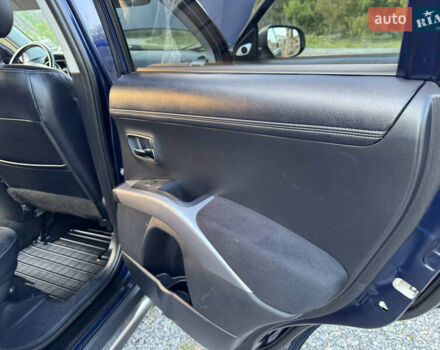 Мицубиси Аутлендер 2011 в Бердичеве на Automoto.ua Синий Мицубиси Аутлендер, объемом двигателя 2.2 л и пробегом 236 тыс. км за 11700 $, фото 61 на Automoto.ua