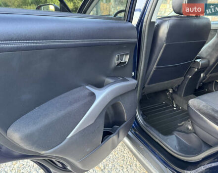 Мицубиси Аутлендер 2011 в Бердичеве на Automoto.ua Синий Мицубиси Аутлендер, объемом двигателя 2.2 л и пробегом 236 тыс. км за 11700 $, фото 53 на Automoto.ua