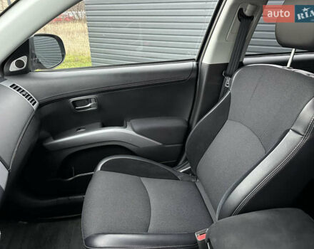 Синий Мицубиси Аутлендер, объемом двигателя 2.3 л и пробегом 202 тыс. км за 11650 $, фото 18 на Automoto.ua