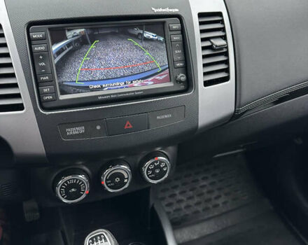 Синий Мицубиси Аутлендер, объемом двигателя 2.3 л и пробегом 202 тыс. км за 11650 $, фото 33 на Automoto.ua