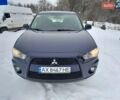 Синий Мицубиси Аутлендер, объемом двигателя 2.27 л и пробегом 272 тыс. км за 10000 $, фото 1 на Automoto.ua
