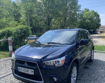Синий Мицубиси Аутлендер, объемом двигателя 2 л и пробегом 185 тыс. км за 9000 $, фото 4 на Automoto.ua