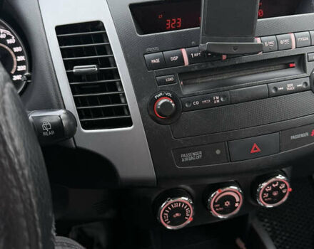 Синий Мицубиси Аутлендер, объемом двигателя 2.2 л и пробегом 213 тыс. км за 12000 $, фото 6 на Automoto.ua