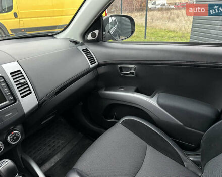 Синий Мицубиси Аутлендер, объемом двигателя 2.3 л и пробегом 202 тыс. км за 11650 $, фото 20 на Automoto.ua