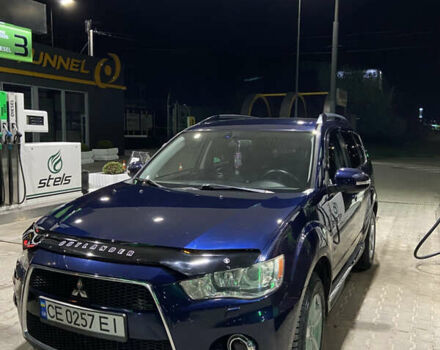 Синий Мицубиси Аутлендер, объемом двигателя 2.27 л и пробегом 262 тыс. км за 10900 $, фото 1 на Automoto.ua