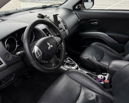 Синий Мицубиси Аутлендер, объемом двигателя 2.2 л и пробегом 213 тыс. км за 12000 $, фото 18 на Automoto.ua