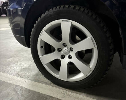 Синий Мицубиси Аутлендер, объемом двигателя 2.2 л и пробегом 213 тыс. км за 12000 $, фото 4 на Automoto.ua