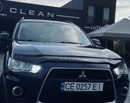 Синий Мицубиси Аутлендер, объемом двигателя 2.27 л и пробегом 262 тыс. км за 10900 $, фото 4 на Automoto.ua