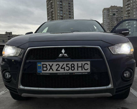 Синий Мицубиси Аутлендер, объемом двигателя 2.2 л и пробегом 213 тыс. км за 12000 $, фото 1 на Automoto.ua