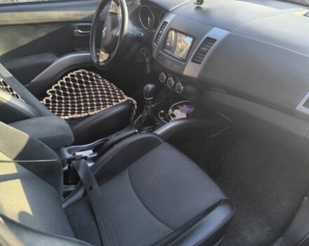 Синий Мицубиси Аутлендер, объемом двигателя 2.2 л и пробегом 284 тыс. км за 5700 $, фото 3 на Automoto.ua