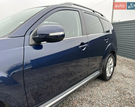 Синий Мицубиси Аутлендер, объемом двигателя 2.3 л и пробегом 202 тыс. км за 11650 $, фото 8 на Automoto.ua