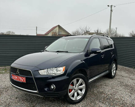 Синий Мицубиси Аутлендер, объемом двигателя 2.3 л и пробегом 202 тыс. км за 11650 $, фото 1 на Automoto.ua