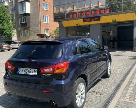 Синий Мицубиси Аутлендер, объемом двигателя 2 л и пробегом 185 тыс. км за 9000 $, фото 5 на Automoto.ua