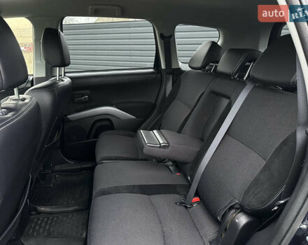 Синий Мицубиси Аутлендер, объемом двигателя 2.3 л и пробегом 202 тыс. км за 11650 $, фото 21 на Automoto.ua