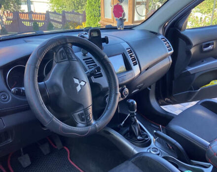 Синий Мицубиси Аутлендер, объемом двигателя 2.27 л и пробегом 262 тыс. км за 10900 $, фото 11 на Automoto.ua