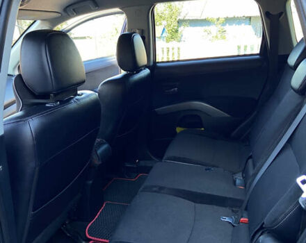 Синий Мицубиси Аутлендер, объемом двигателя 2.27 л и пробегом 262 тыс. км за 10900 $, фото 13 на Automoto.ua