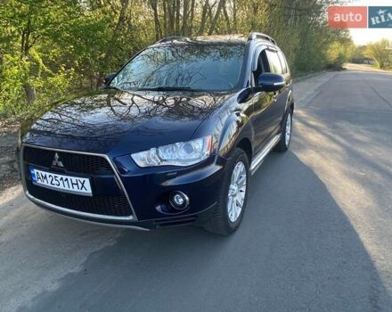 Синий Мицубиси Аутлендер, объемом двигателя 2.18 л и пробегом 220 тыс. км за 12500 $, фото 1 на Automoto.ua