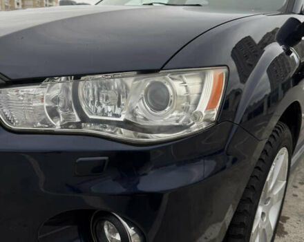 Синий Мицубиси Аутлендер, объемом двигателя 2.2 л и пробегом 213 тыс. км за 12000 $, фото 26 на Automoto.ua