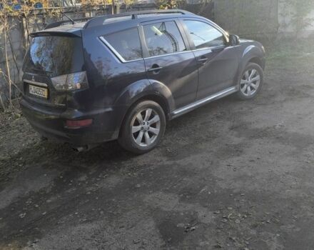 Синий Мицубиси Аутлендер, объемом двигателя 2.2 л и пробегом 284 тыс. км за 5700 $, фото 5 на Automoto.ua