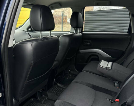 Синий Мицубиси Аутлендер, объемом двигателя 2.3 л и пробегом 202 тыс. км за 11650 $, фото 22 на Automoto.ua