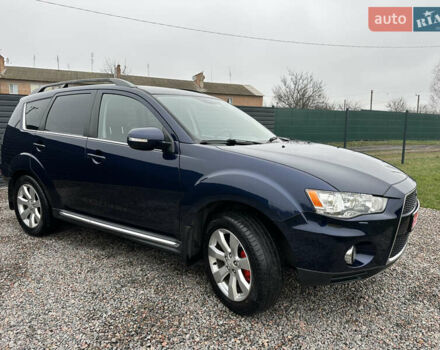 Синий Мицубиси Аутлендер, объемом двигателя 2.3 л и пробегом 202 тыс. км за 11650 $, фото 5 на Automoto.ua