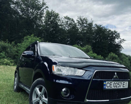 Синий Мицубиси Аутлендер, объемом двигателя 2.27 л и пробегом 262 тыс. км за 10900 $, фото 2 на Automoto.ua
