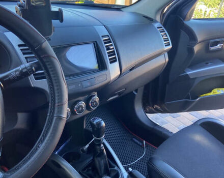 Синий Мицубиси Аутлендер, объемом двигателя 2.27 л и пробегом 262 тыс. км за 10900 $, фото 12 на Automoto.ua