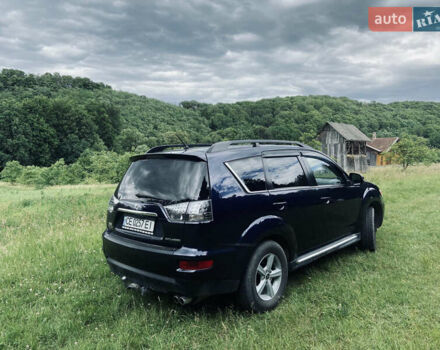 Синий Мицубиси Аутлендер, объемом двигателя 2.27 л и пробегом 262 тыс. км за 10900 $, фото 3 на Automoto.ua