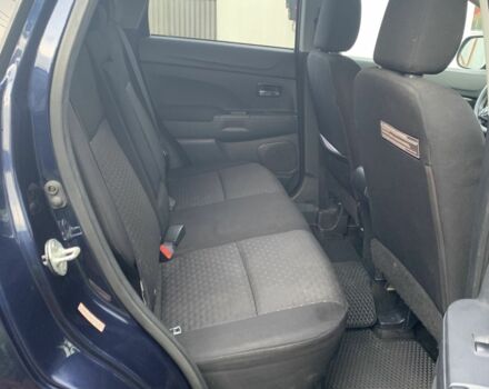 Синий Мицубиси Аутлендер, объемом двигателя 2 л и пробегом 185 тыс. км за 9000 $, фото 1 на Automoto.ua