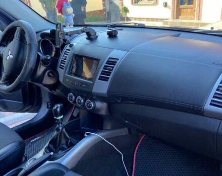 Синий Мицубиси Аутлендер, объемом двигателя 2.27 л и пробегом 262 тыс. км за 10900 $, фото 14 на Automoto.ua