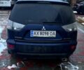 Синій Міцубісі Аутлендер, об'ємом двигуна 2.4 л та пробігом 250 тис. км за 11800 $, фото 1 на Automoto.ua