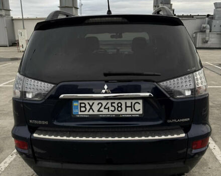 Синий Мицубиси Аутлендер, объемом двигателя 2.2 л и пробегом 213 тыс. км за 12000 $, фото 2 на Automoto.ua