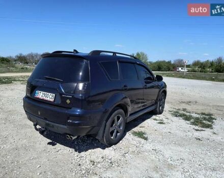 Синій Міцубісі Аутлендер, об'ємом двигуна 2.2 л та пробігом 270 тис. км за 12300 $, фото 3 на Automoto.ua
