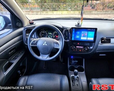 Синий Мицубиси Аутлендер, объемом двигателя 2 л и пробегом 314 тыс. км за 10999 $, фото 8 на Automoto.ua