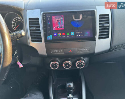 Синий Мицубиси Аутлендер, объемом двигателя 2.2 л и пробегом 192 тыс. км за 13490 $, фото 20 на Automoto.ua