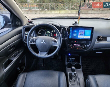 Мицубиси Аутлендер 2012 в Харькове на Automoto.ua Синий Мицубиси Аутлендер, объемом двигателя 2 л и пробегом 314 тыс. км за 11800 $, фото 9 на Automoto.ua