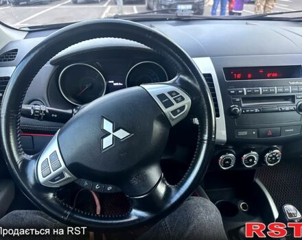 Синій Міцубісі Аутлендер, об'ємом двигуна 2.3 л та пробігом 232 тис. км за 12600 $, фото 4 на Automoto.ua