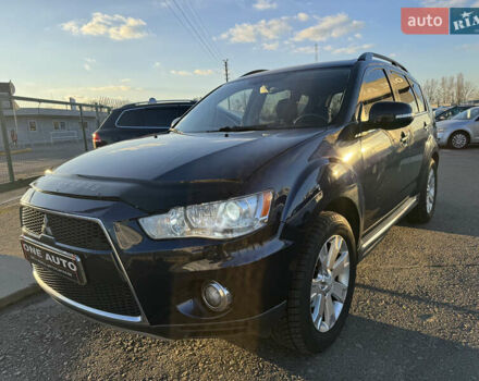Синий Мицубиси Аутлендер, объемом двигателя 2.2 л и пробегом 192 тыс. км за 13490 $, фото 1 на Automoto.ua